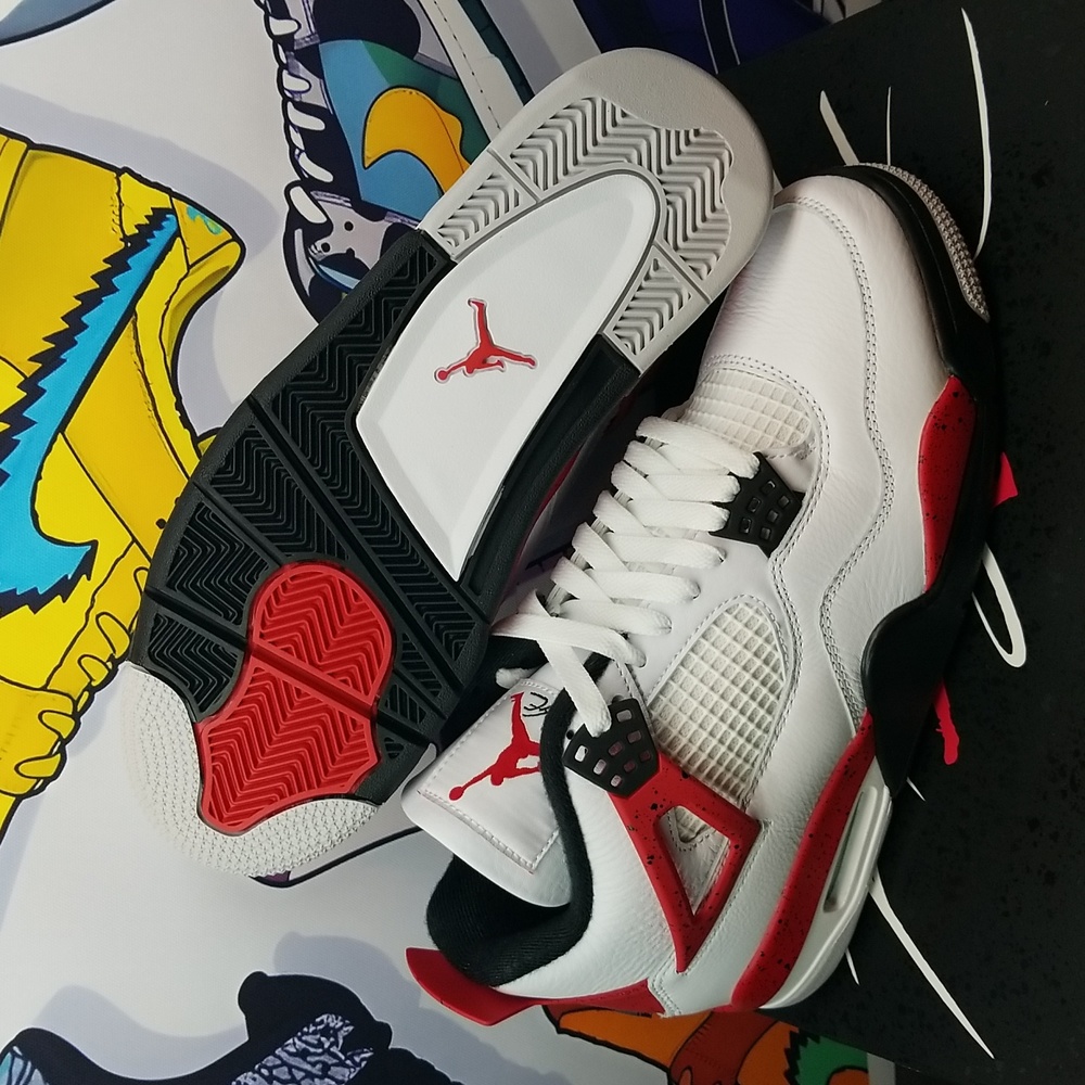 fake fire red jordan 4